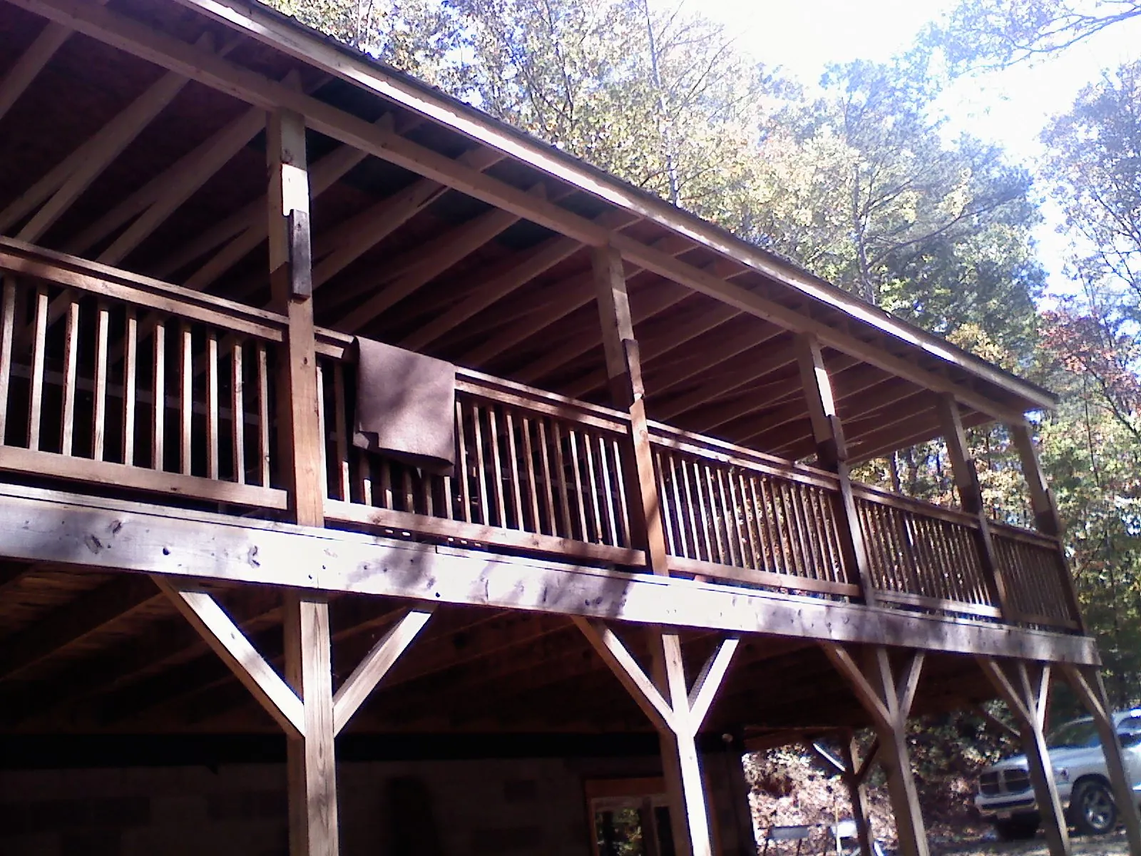 Timber framing under a new elevated porch and deck — Roof Leak Repair in Litchfield by Roofing Brothers